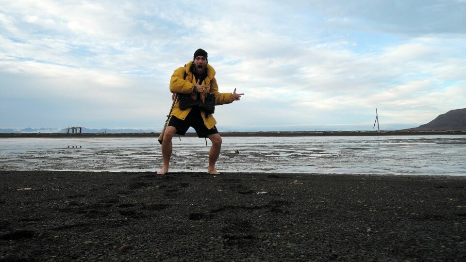 Stevie is about to cross the cold river near Coles Bay. But first, a selfies.