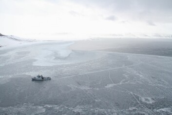 KV «Svalbard» in Tempelfjorden. On the picture you can see the scooter tracks and the holes in the ice. KV «Svalbard» in Tempelfjorden. On the picture you can see the scooter tracks and the holes in the ice.